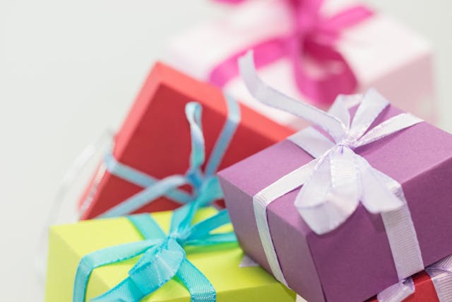 Gift boxes with ribbons in different colors.
